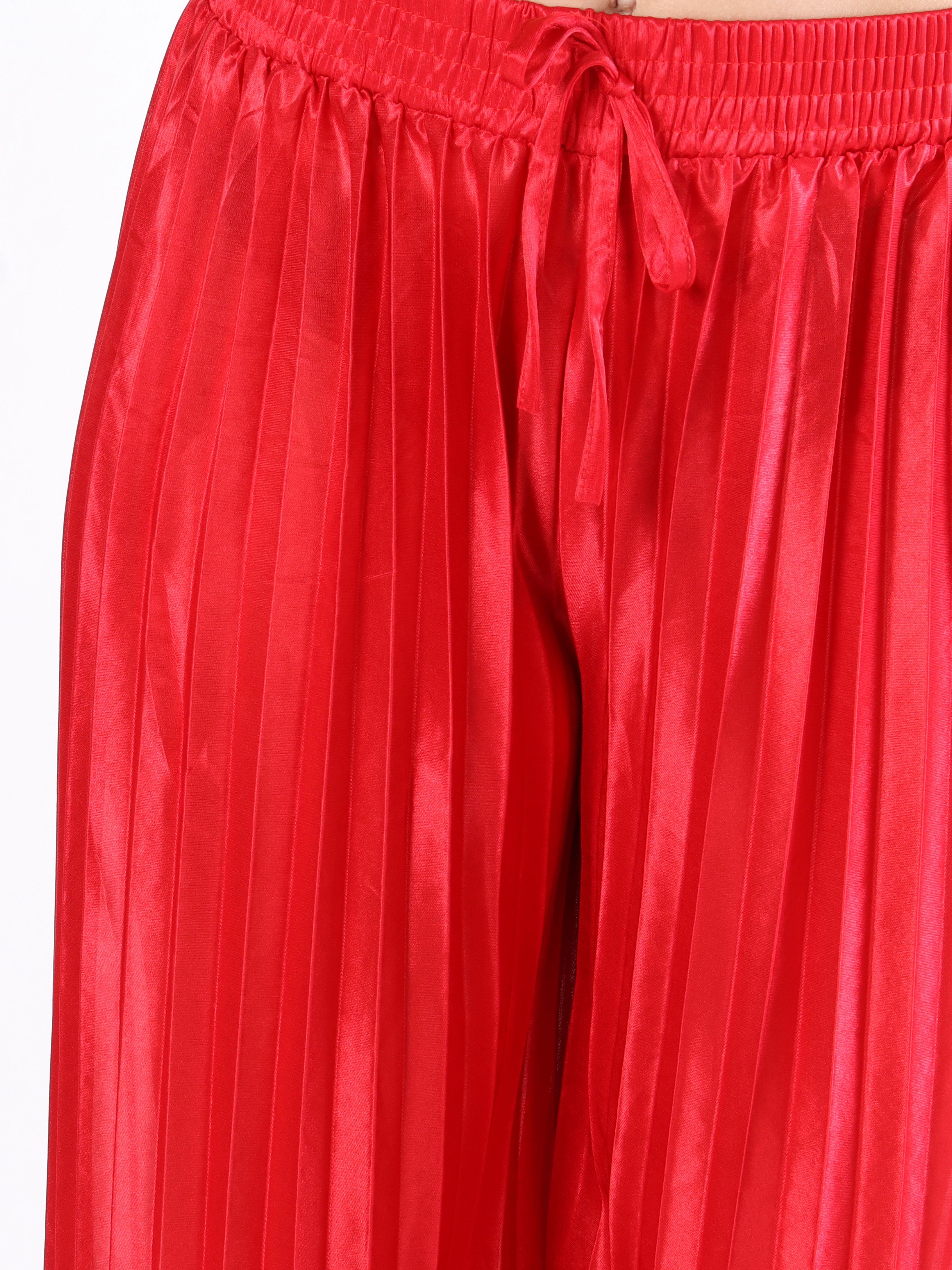 Callie - Enkla plisserade byxor i glänsande tyg